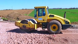 Compacteur BOMAG amp pelle KOBELCO  Rambervillers [upl. by Harbard]