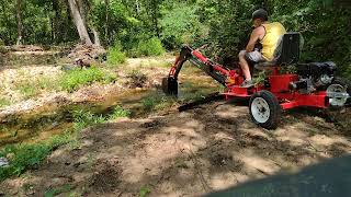 Digging out some creek with the Harbor Freight Backhoe [upl. by Tomkin585]