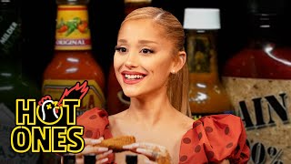 Ariana Grande Hits a High Note While Eating Spicy Wings  Hot Ones [upl. by Nairot]