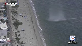 Waterspout comes ashore as tornado on Hollywood Beach [upl. by Belter]