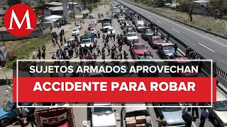 Reportan asalto masivo a automovilistas en tramo de autopista VeracruzPuebla [upl. by Niattirb365]