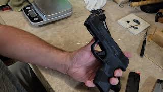 Mossberg mc2c unboxing and size comparisonwow its slim [upl. by Esinwahs]