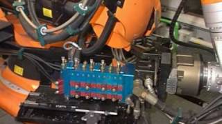 Handling of diecast parts with a KUKA robot [upl. by Glovsky181]