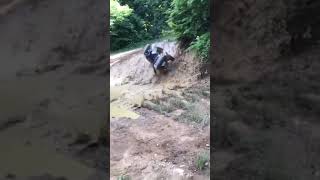 Man Climbing Hill on ATV Accidentally Falls Off and Lands Into Mud  1453552 [upl. by Myca]