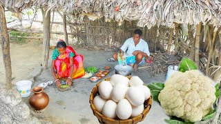 EGG CAULIFLOWER RECIPE and KOLMI SHAK VAJI cooking by our tribe old couple for lunch [upl. by Clorinda532]