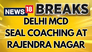 Delhi Coaching Flood  MCD Officials at Delhis Rajendra Nagar Seals Several Coaching Institutions [upl. by Arataj462]