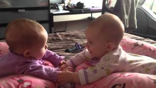 Twin babies talk and hold hands for the first time [upl. by Sudnor]