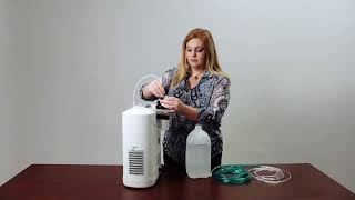 Inogen at home set up your concentrator using a humidifier MultiDoctorShopcom [upl. by Atinuaj]