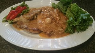 OVEN BAKED SMOTHERED PORK CHOPS [upl. by Cassilda23]