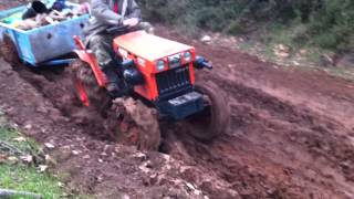 Kubota B7001 4x4 in way through a lot of mud INCREDIBLE [upl. by Porta597]