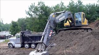 Volvo EC210 Excavator Rocking Out Trucks [upl. by Swanhilda]