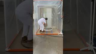 Spraying hollow core doors with ease PaintLines door spray and drying system painting tools [upl. by Aicinet812]