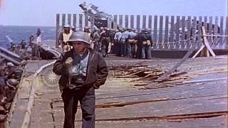 Damage on USS Bunker Hill after it was attacked by a suicide aircraft while underHD Stock Footage [upl. by Atis111]