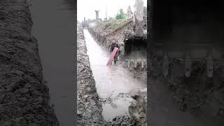 Excavator digging canal process [upl. by Mullen834]