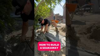 We built a soakaway to stop water buildup landscaping diy construction [upl. by Leahcin]