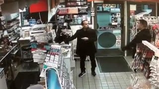 Offduty cop pulls gun on man buying candy at California convenience store [upl. by Eikcin]