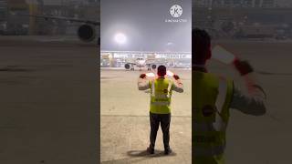 How aircraft marshalling is done aviation shorts ytshorts [upl. by Anelah]