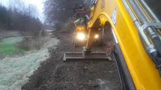 building driveway and repair with jcb 8055 and home made grading beam [upl. by Xylia]