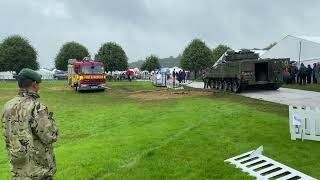 Burning Man  See how a British Army Tank deals with this mud stuck fire engine at UK festival [upl. by Mailli]