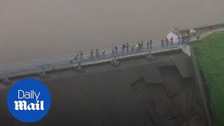 Derbyshire town evacuated as dam wall collapses [upl. by Gretna284]