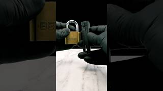 Coolest way to open a beer but its a padlock and we’re shilling new tools you dont need but want [upl. by Anidal]