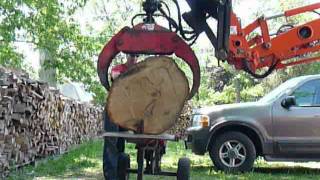 Supersplit splitting a large Oak butt log loaded with Beaver Squeezer [upl. by Tray]