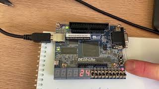 4bit computer on DE10Lite FPGA implementing 2 bit counter stepping by debounced push button VHDL [upl. by Nywles876]