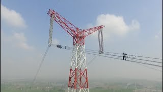 quotSkywalkingquot On The ±1100KV Ultrahigh Voltage Liveline in China [upl. by Nailimixam]