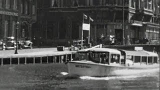 1934 Rondvaart door de Amsterdamse grachten en haven te Amsterdam  oude filmbeelden [upl. by Marys]