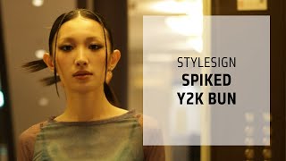 Sleek Spiked Y2K Bun Tutorial  StyleSign  Goldwell Education Plus [upl. by Halilak]