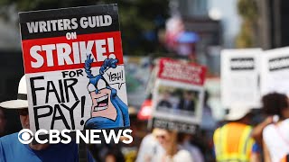 WGA studios reach tentative deal to end writers strike [upl. by Oilenroc]