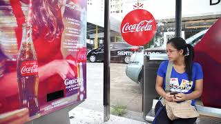 CocaCola dispenser at Panama Bus shelter for Christmas  JCDecaux Top Media Panama [upl. by Llerrej713]