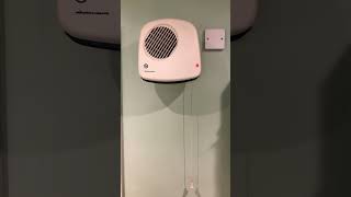 Turning on the Winterwarm wall mounted fan heater to warm up the bathroom for 2 minutes [upl. by Wendie419]