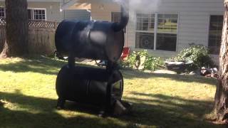 Smoking salmon with applewood on double drum smoker [upl. by Laddy]