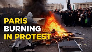 Paris Protesters And Police Clash After French President Macron Forces Through Pension Age Rise [upl. by Asirac]