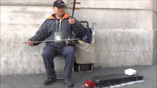 Traditional Chinese Music with single stringed instrument Piccadilly Circus London Street Music [upl. by Tomas]