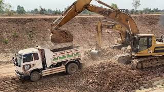 Excavator digging a canal Nimitt Village [upl. by Dede248]