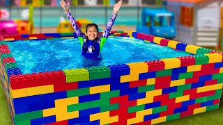 Jannie Teaches Ellie How to Swim in the Kids Pool and Plays with Fun Water Toys [upl. by Bodnar874]