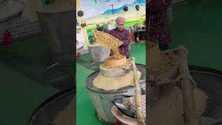 The process of grinding grains into powder with stone mills [upl. by Zsa Zsa915]