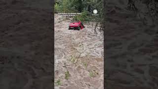 Mini Cooper Bobs Downstream During France Flooding [upl. by Willie]