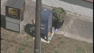 Bomb Tech carefully examines suspicious package in South Tampa [upl. by Marfe]