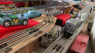 Carrera Slot car Track Transported By Lionel RSSlot car Action on the Railroad [upl. by Oinotnanauj]