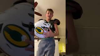 How to put on football pads and helmet [upl. by Tobin203]