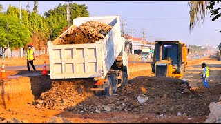 Skillful Dozer Operator Is Making Foundation Road For High Way With Truck Unloading Rock Soils [upl. by Craggie]