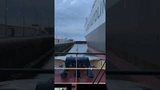 Tugboat in biggest sea lock in the world located in IJmuiden Gateway to the world [upl. by Ettedranreb]