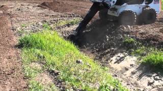 Skid Steer Attachments for Building a Motocross Track [upl. by Richart]