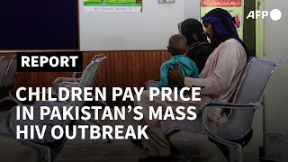 Children pay the price in Pakistans mass HIV outbreak  AFP [upl. by Ahsal]