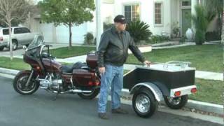 Aluminium motorcycle cargo trailer pulled by a motorcycle [upl. by Lrae]