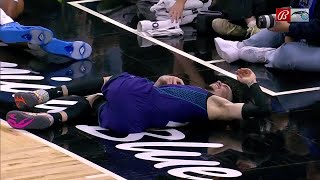 LaMelo Ball carried off the floor after awkward fall  NBA on ESPN [upl. by Nehgam904]