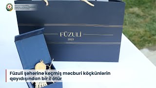 Füzuli şəhərinə keçmiş məcburi köçkünlərin qayıdışından bir il ötür [upl. by Allesiram314]